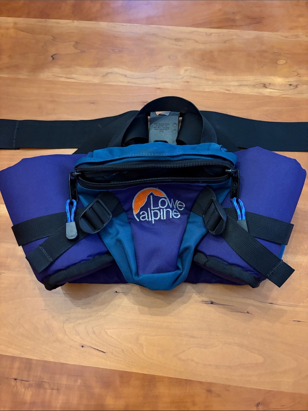 Lowe Alpine Women's Travel Waist Pack in Purple and Teal